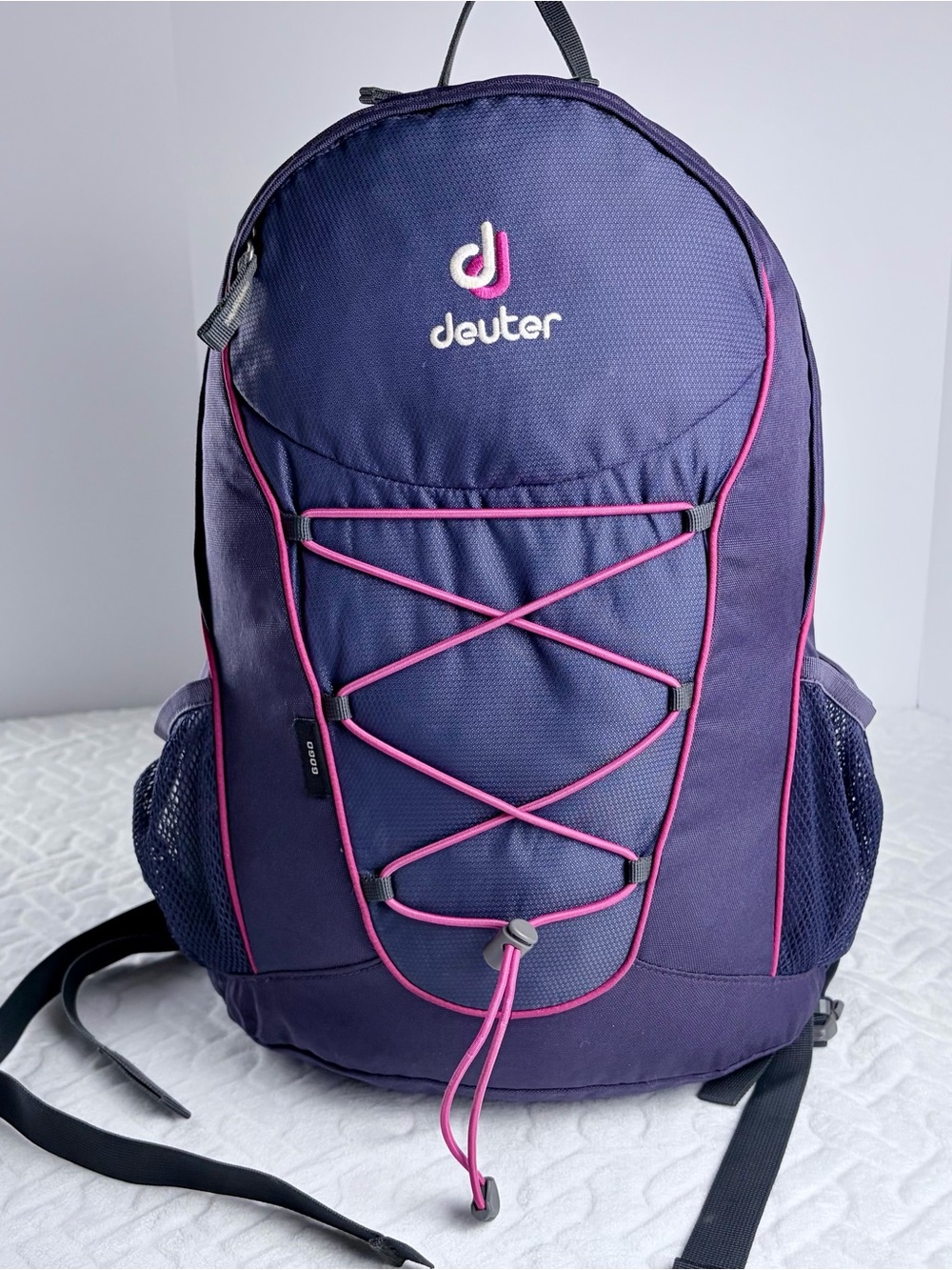 Deuter GoGo light hiking backpack purple with pink trim breathable straps